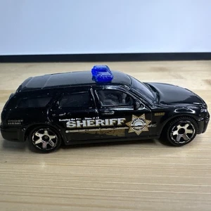 Black 2005 MATCHBOX DODGE CITY SHERIFF DODGE MAGNUM DIECAST POLICE VEHICLE Toy - Picture 1 of 9
