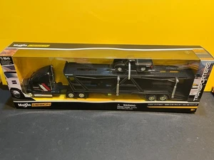 1/64 MAISTO MACK ANTHEM CAR HAULER WITH 1993 CHEVROLET PICKUP SS454 BLACK - Picture 1 of 3