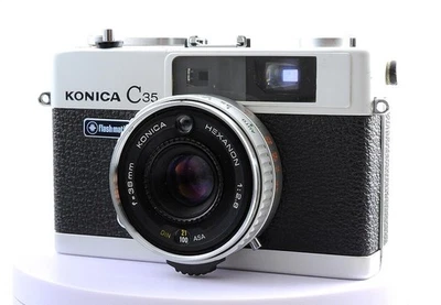 [NEAR MINT] Konica C35 Flash matic Film Camera 38mm HEXANON F2.8 From JAPAN - Image 1 of 4