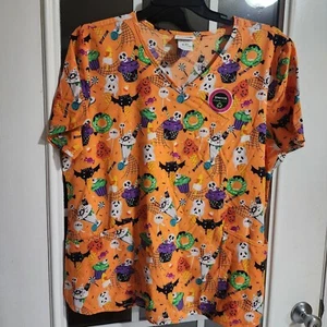 Women's Halloween Scary Sweets Scrub Top from Scrubstar - Picture 1 of 7