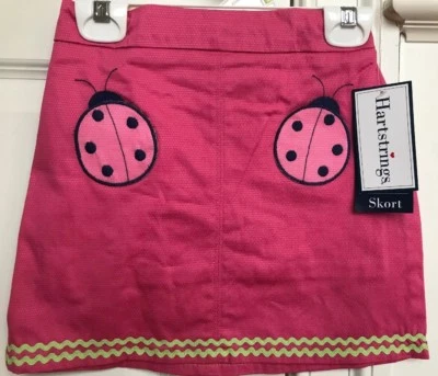 Nuevo con etiquetas Falda Hartstrings para Niñas, Talla 6x, Rosa con Bolsillos Ladybug y Borde Verde Foto 1 de 4