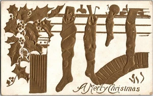 Medias con impresión en bloque de Navidad acebo dorado c1910 postal vintage KO2 - Imagen 1 de 2