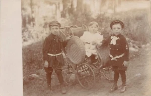 RPPC * 3 Children w/ Fancy Wicker Stroller Boys in Tiny U.S. Navy Uniforms 1910s - Picture 1 of 2