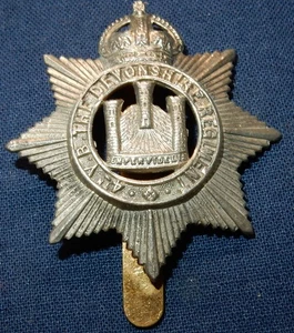 4th VB VOLUNTEER BATTALION THE DEVONSHIRE REGIMENT CAP BADGE SLIDER K/C - Foto 1 di 2