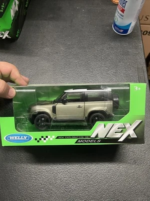 Land Rover Defender 2020 verde metálico diecast modelo Welly 24110MGR escala 1:26 Foto 1 de 3
