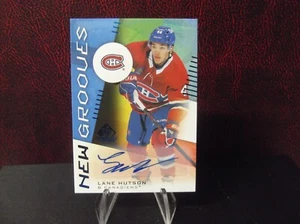 LANE HUTSON 2024-25 SP JUEGO USADO HOCKEY AUTOGRAFIADO RC AZUL NUEVAS RANURAS - Imagen 1 de 2
