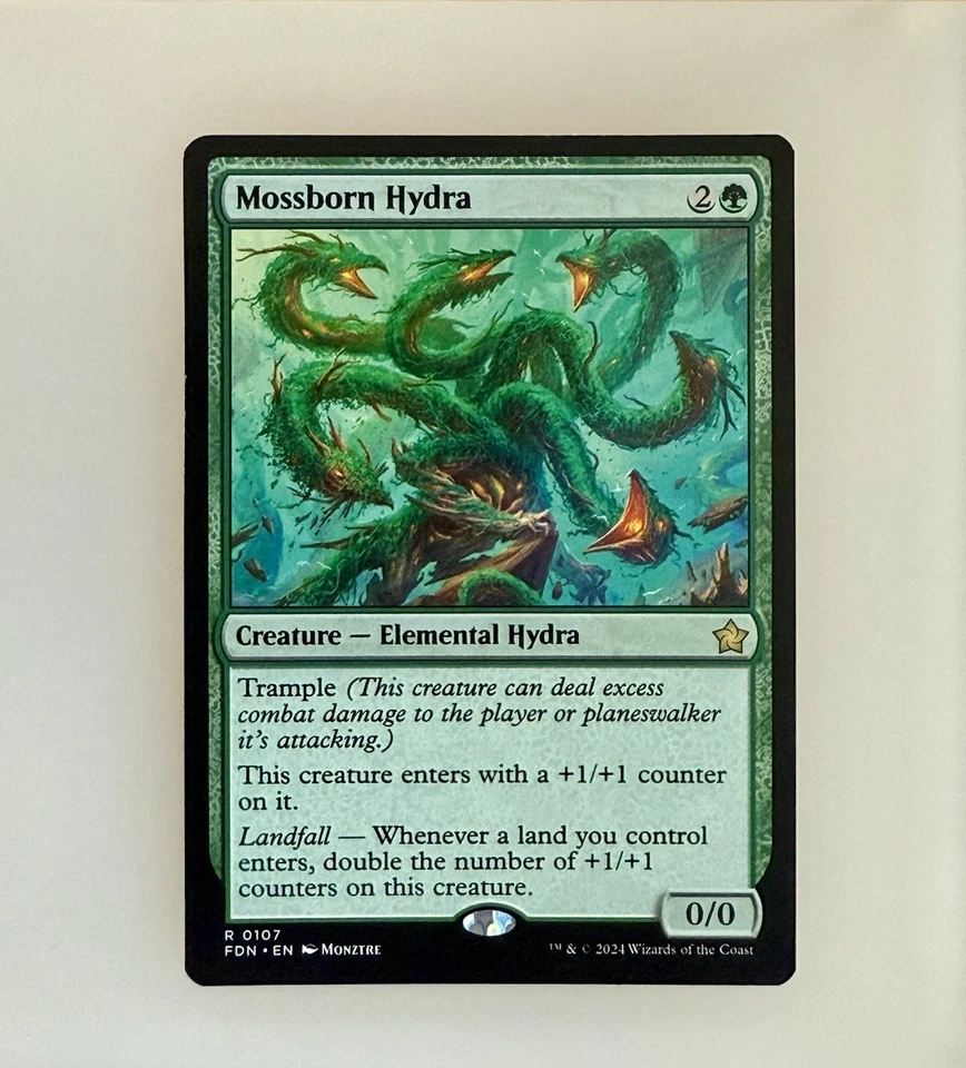 Magic the Gathering: Mossborn Hydra Foundations Regular NM - Image 1 of 2