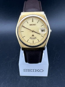 Reloj de cuarzo Seiko Majesta 1992 para hombre día fecha esfera dorada 34 mm 9533-6000 - Imagen 1 de 12