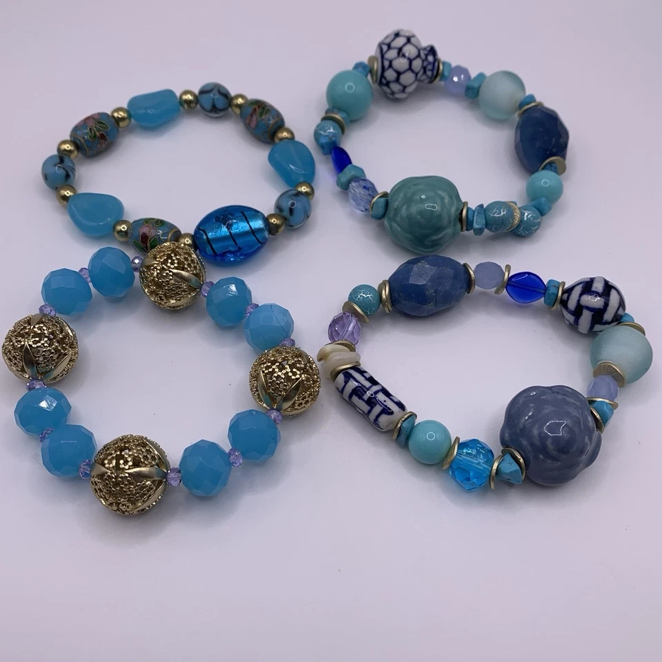 Lote de cuatro pulseras con cuentas azul verde aguamarina flor elástica porcelana cloisonné  Foto 1 de 4
