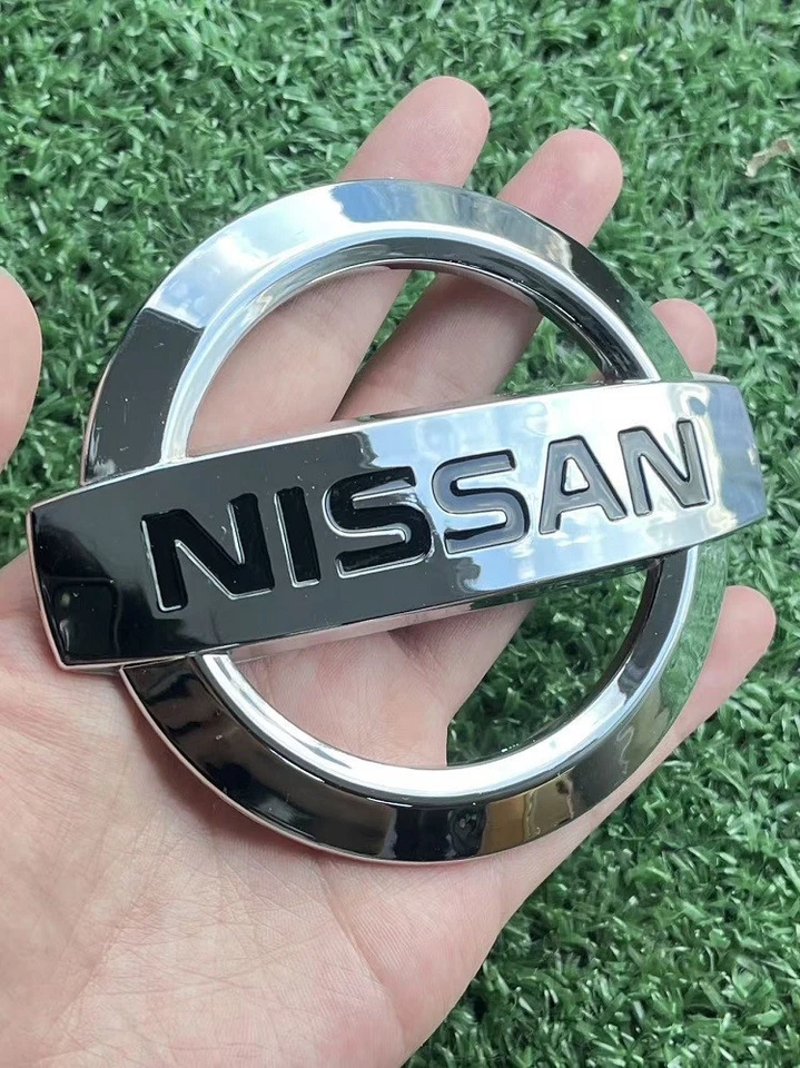NISSAN 12-17 GRILLE EMBLEMS NEW BADGE 370Z OEM FRONT OR REAR 03-16 VERSA REARNEW - Image 1 of 4