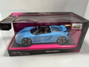 Caja dañada Jada 1:24 Rosa Slips Porsche Carrera GT Diecast l Coche Azul Claro 2 - Imagen 1 de 5