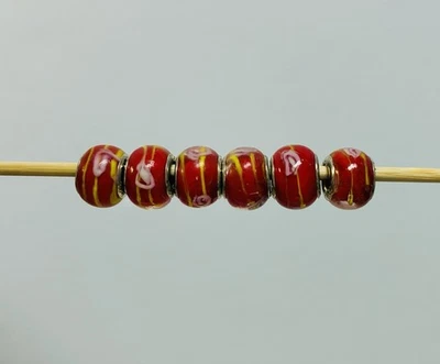 Lote de 6 Trollbeads de vidrio de ley. Rojo con remolinos amarillos Foto 1 de 4
