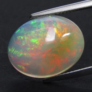 Piedra preciosa ovalada de ópalo blanco de juego de colores naturales brillantes de 7,88 quilates de Etiopía-VDO - Imagen 1 de 4