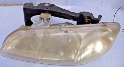 Montaje de faros Pontiac Grand Am 1996-1997-1998 y lado de transmisión de canastilla // Foto 1 de 4