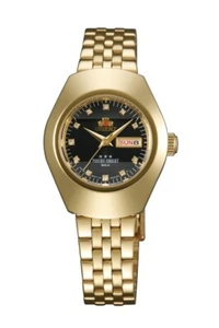 NOS Orient Damenuhr Automatik Tristar Tag Datum schwarzes Zifferblatt NQ22001B hergestellt in Japan - Bild 1 von 1