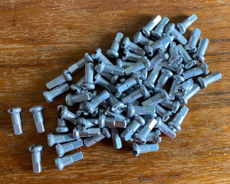 UNBRANDED NIPPLES 2.0 x 12MM SILVER NEW BIKE BICYCLE WHEEL MOUNTING QTY70 - Image 1 of 1