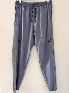 Pantalones de correr Nike AeroSwift Dri-FIT ADV para hombre talla mediana gris FN3361-003 NUEVOS CON ETIQUETAS - Imagen 1 de 10