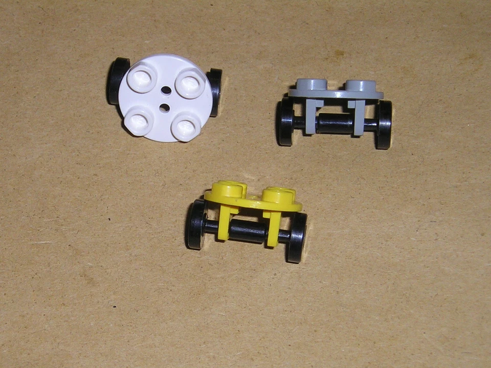 Lego 2x Achsplatte Radhalter 2655 2x2 rund Trolley Felge 2496 Farbauswahl (R 12) - Bild 1 von 4