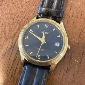 Reloj de cuarzo vintage Lanco para hombre esfera de fecha tono dorado correa de cuero funciona - Imagen 1 de 7