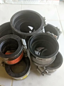 Assortment of (7) No Hub Coupling Reducers Anaco Mission Fernco - Picture 1 of 4