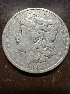 1894 O New Orleans Morgan 90% Silver Dollar - Picture 1 of 2