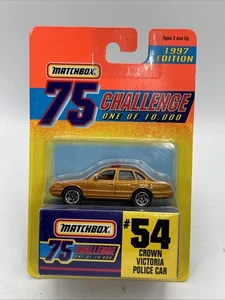 1997 Matchbox 75 Challenge #54 Crown Victoria Police Car (Gold) - Picture 1 of 4