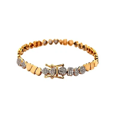 Brazalete de oro amarillo de 14K y diamantes de forma surtida Foto 1 de 2