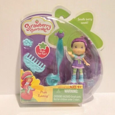 Mini muñeca Strawberry Shortcake ciruela pudín 3" figura perfumada peine Hasbro 2010 Foto 1 de 4