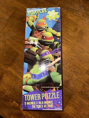 Used  Teenage Mutant Ninja Turtles Tower Puzzle 50 Piece 18"x5" All Here - Image 1 of 2