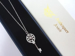 TWINKLING STERLING SILVER & CZ "DANCING GEMSTONE" PENDANT/NECKLACE. DANCE KEY 1 - Picture 1 of 4