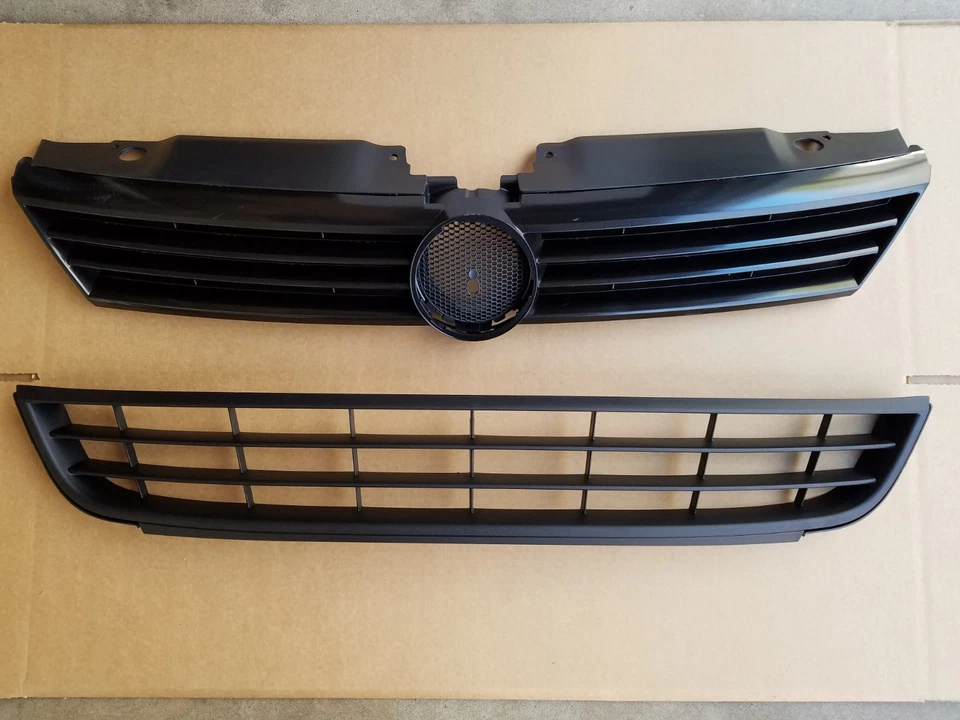 Par de 2 piezas de parachoques delantero VOLKSWAGEN JETTA 2011-2014 negro rejilla superior e inferior NUEVO Foto 1 de 2