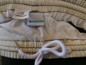 Pantalones de calentamiento de pista de tenis Diadora vintage, pantalones y bolsillos con cremallera en muy buen estado+ - Imagen 1 de 15