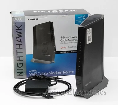 Router módem NETGEAR Nighthawk CAX80 AX6000 8 transmisiones Wi-Fi 6 cables Foto 1 de 4
