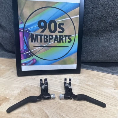 Palancas de freno CNC Kooka Racha - MTB vintage años 90 - Ana negro - COMO NUEVO - cubiertas de espuma - retro Foto 1 de 4