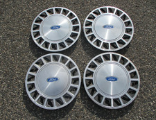 Factory 1988 to 1994 Ford Tempo Aerostar 14 inch metal hubcaps wheel covers set