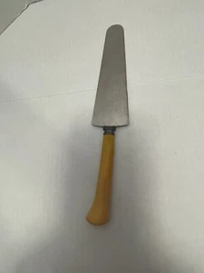 Vintage 40s Butterscotch Bakelite Stainless Steel Cake Knife Server Harvest Gold - Picture 1 of 3