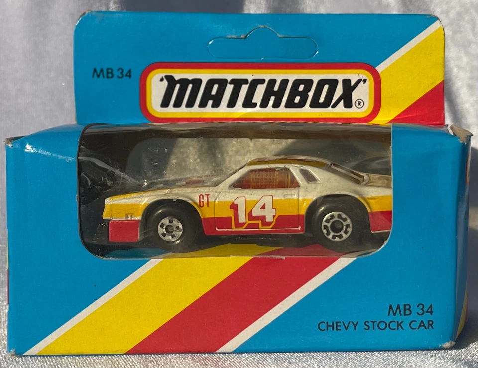 Matchbox-(1-75) - 34f Chevy Stock Car White Yellow Red 14 Livery light Blue box - Image 1 of 1