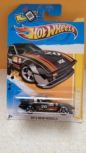 Hot Wheels #31 2012 nuevos modelos 31/50 Mazda RX-7 negro con ruedas de radios cromadas MC5 - Imagen 1 de 2
