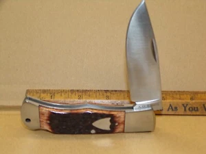 VINTAGE A.G. RUSSELL LOCKBACK FOLDING HUNTER W/ JIGGED BONE - NEW OLD STOCK ! - Picture 1 of 13