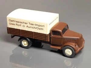 Wiking, Opel Blitz 1936 Pritschen-LKW, Sondermodell ,Tee-Import, Vitr.-Mod. 1:87 - Bild 1 von 4