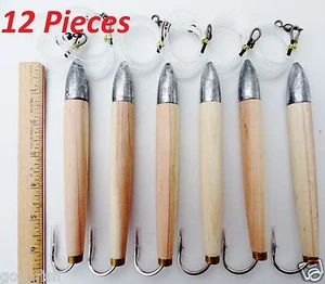 12 señuelos de pesca de agua salada aparejados con tapones de cedro natural de 6" - Imagen 1 de 6