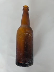 Botella de cerveza de vidrio ámbar Pabst Milwaukee antigua en relieve “no se vende” - Imagen 1 de 5