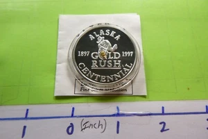 Moneda de plata 999 pepita de oro real 100 de Alaska Mint Gold Rush 1997 certificado de autenticidad rara 5gr9 - Imagen 1 de 4