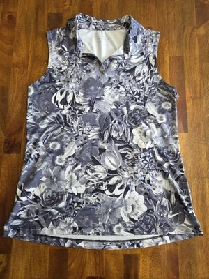 Polo de golf Nike Dri-FIT para mujer pequeño sin mangas floral AJ5327 gris Foto 1 de 4