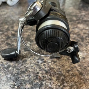 SHIMANO AX 100 Fishing Reel Graphite Titanium Quick Fire 2 SPINNING Rear Drag - Picture 1 of 6