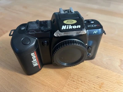 Cámara fotográfica Nikon N4004 35 mm - PROBADA, TODAS funcionando Foto 1 de 4
