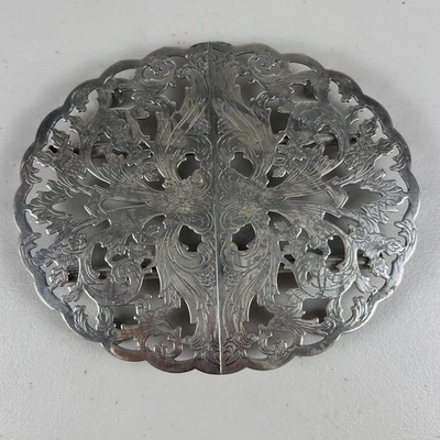 Remache plateado expandible vintage Lundt por M-20 Hot Plate pies aislados Foto 1 de 4