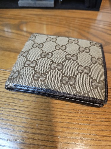 Portafoglio unisex Gucci monogramma bi piega marrone scuro beige rivestito tela bordo pelle