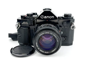 Canon A-1 Film Camera 35mm SLR + FD 50mm f/1.4 Prime Lens + Nr Mint + Extras - Picture 1 of 11