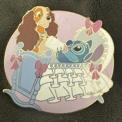 Disney Auctions Exclusive Stitch in Cradle with Lady LE 1000 - Image 1 of 3